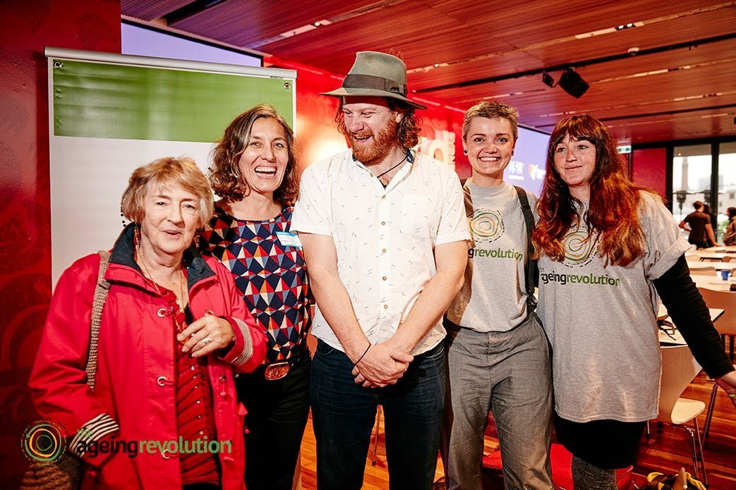 PTR's founders standing with colleagues in a group at an industry event