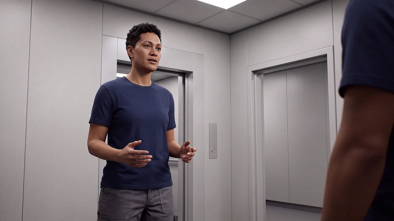 A man stands in a lift lobby facing the closed doors, a hand raised mid-request, another person at the edge of the frame.