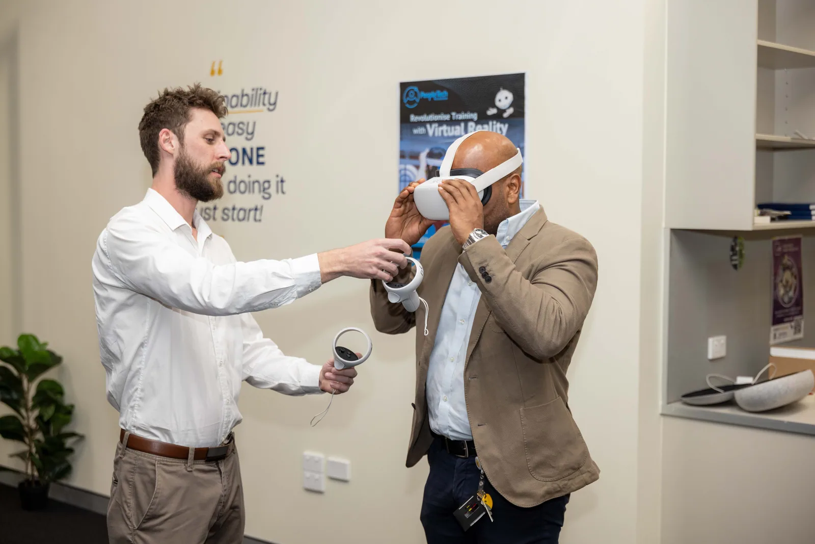 Fitting a headset for a guest after the panel. PTR VR Library public launch at Smart Precinct NQ, Townsville, 18 July 2024.