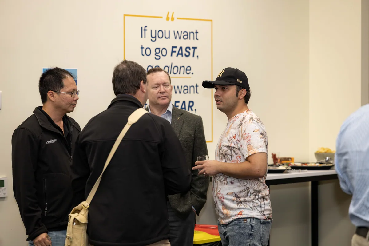 A group standing together before the talks. PTR VR Library public launch at Smart Precinct NQ, Townsville, 18 July 2024.