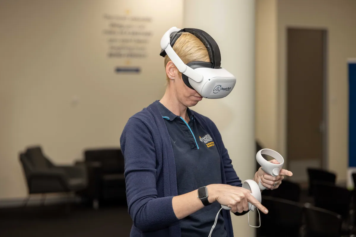 A guest exploring the scene in the headset. PTR VR Library public launch at Smart Precinct NQ, Townsville, 18 July 2024.