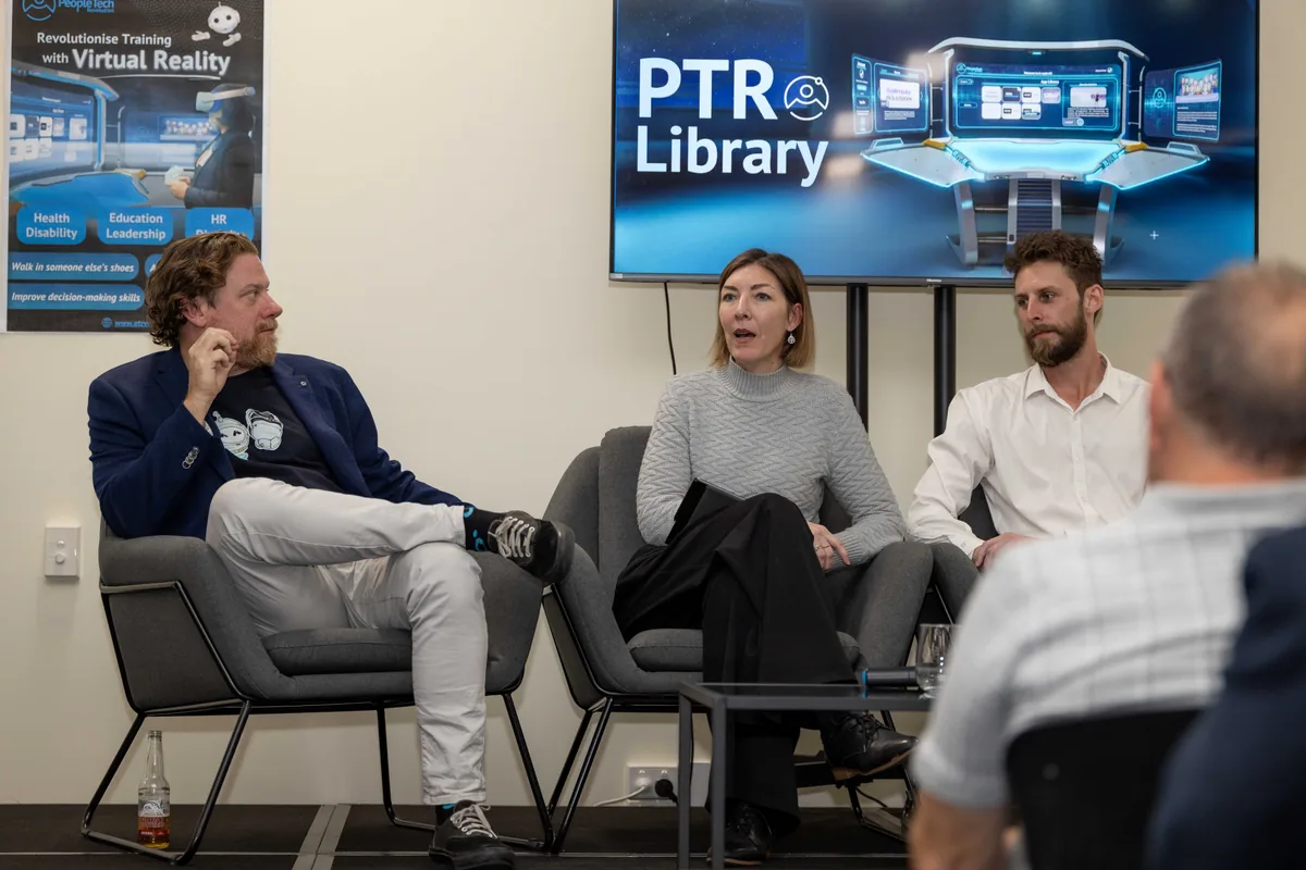 The panel mid-discussion by the screen. PTR VR Library public launch at Smart Precinct NQ, Townsville, 18 July 2024.