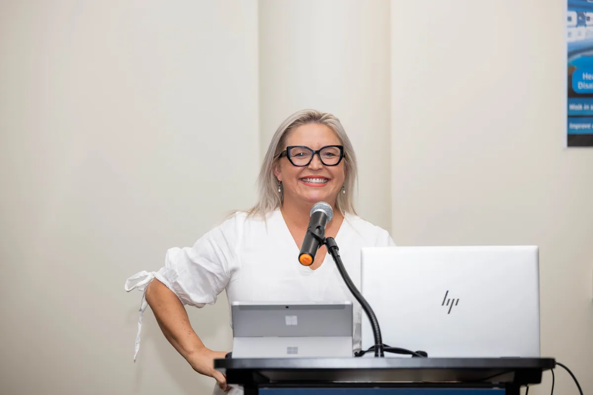 Speaking to the room from the lectern. PTR VR Library public launch at Smart Precinct NQ, Townsville, 18 July 2024.