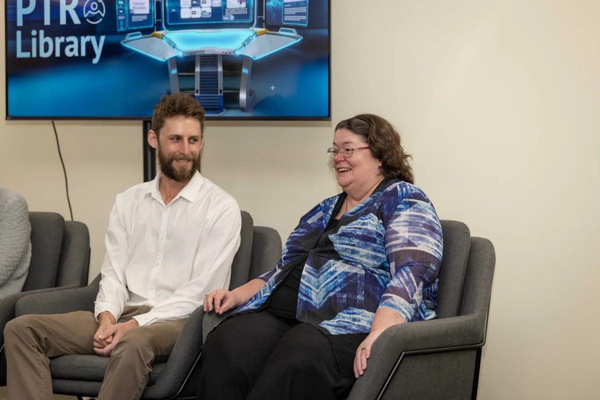 Two panellists sharing a laugh. PTR VR Library public launch at Smart Precinct NQ, Townsville, 18 July 2024.