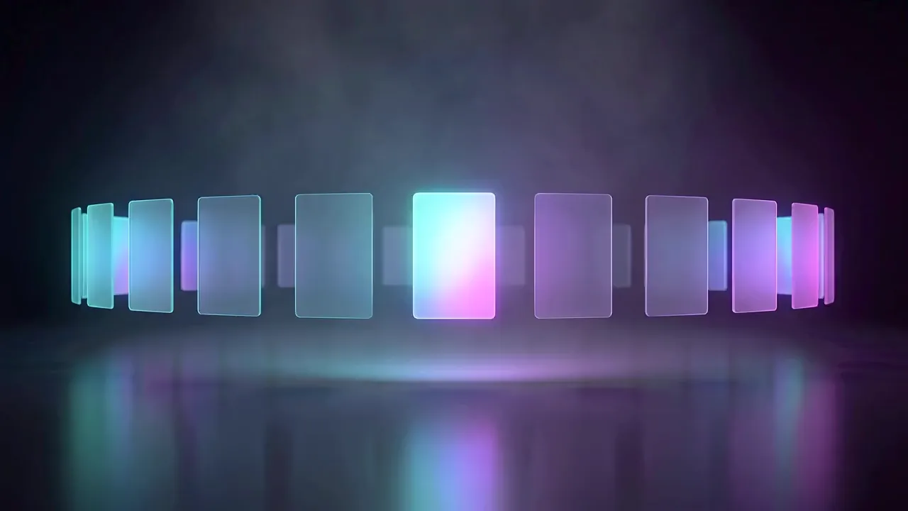 A row of glowing panels stands in a dark studio, one of them lit brighter than the rest.