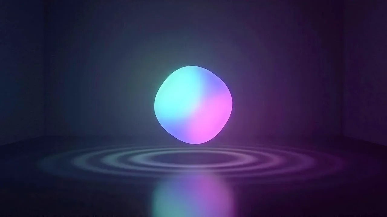 A glowing sphere hangs above a dark floor, rings of light spreading outward from beneath it.